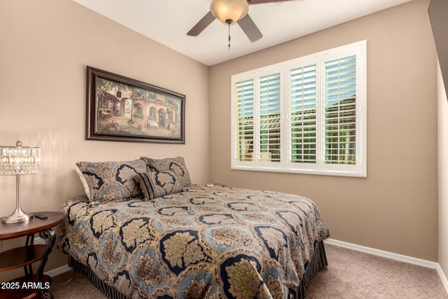 7504 W Patriot Way, Florence, AZ 85132 - carpeted bedroom featuring baseboards and a ceiling fan