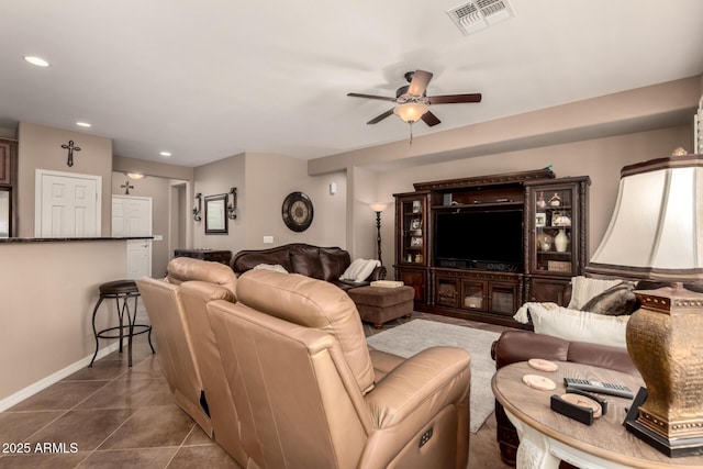 7504 W Patriot Way, Florence, AZ 85132 - living area featuring ceiling fan, dark tile patterned flooring, and recessed lighting
