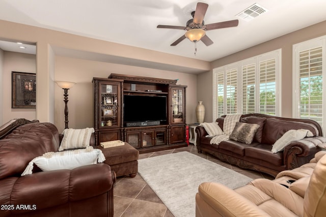 7504 W Patriot Way, Florence, AZ 85132 - living area featuring tile patterned flooring and ceiling fan