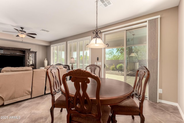 7504 W Patriot Way, Florence, AZ 85132 - dining space featuring light tile patterned floors and a ceiling fan