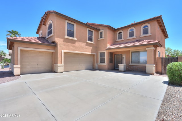 view of front of property with a garage