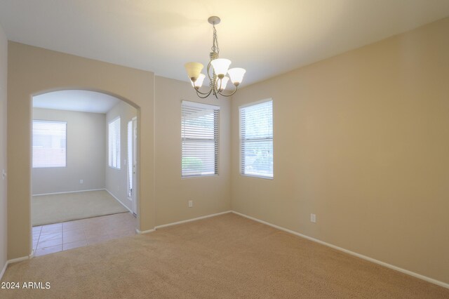 laundry room with cabinets, sink, washer hookup, light tile patterned floors, and hookup for an electric dryer