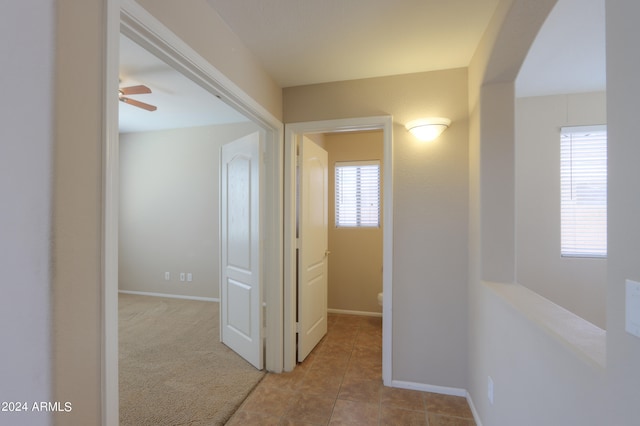 corridor with light carpet