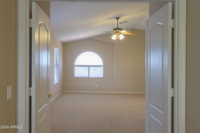 bathroom featuring plus walk in shower, tile patterned flooring, and a healthy amount of sunlight