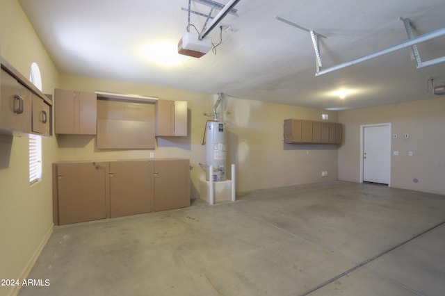 garage featuring gas water heater and a garage door opener