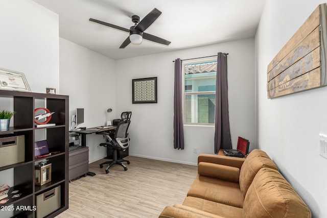 office featuring ceiling fan and light hardwood / wood-style floors