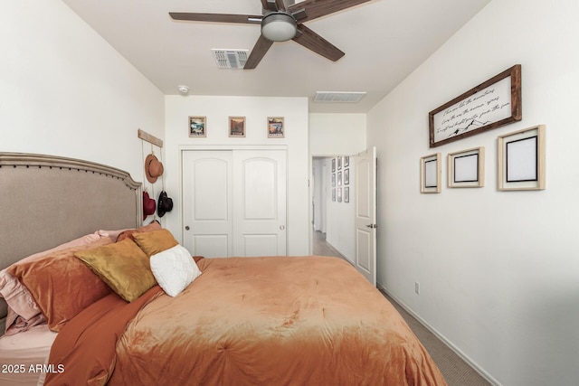 bedroom featuring ceiling fan, carpet flooring, and a closet