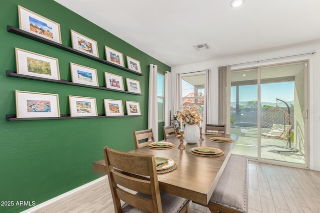 dining area featuring light hardwood / wood-style floors