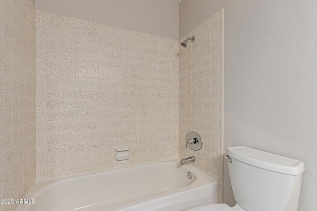 full bath featuring shower / bath combination and toilet