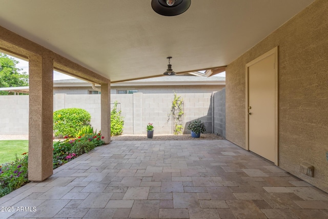 view of patio / terrace featuring fence