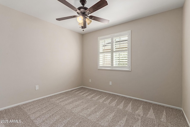 unfurnished room with carpet floors, ceiling fan, and baseboards