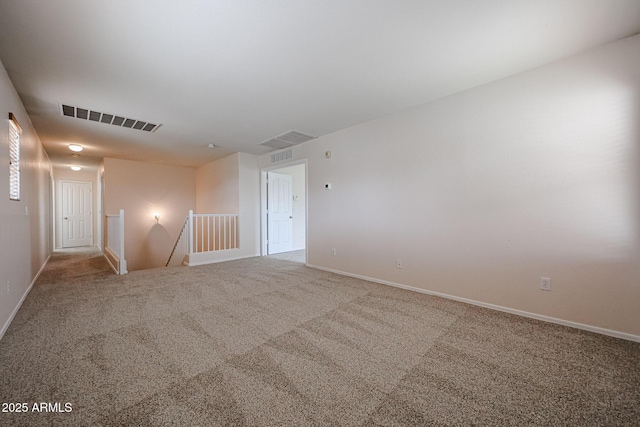 4804 S 25th Dr, Phoenix, AZ 85041 - spare room featuring carpet flooring and baseboards