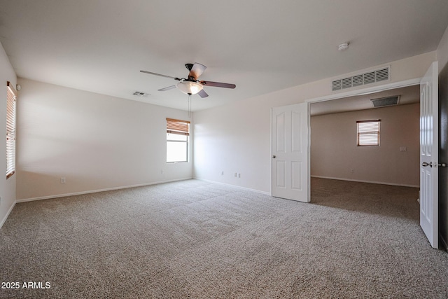 4804 S 25th Dr, Phoenix, AZ 85041 - carpeted spare room with ceiling fan, healthy amount of natural light, and baseboards