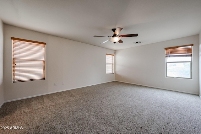 4804 S 25th Dr, Phoenix, AZ 85041 - spare room featuring carpet flooring, ceiling fan, and baseboards