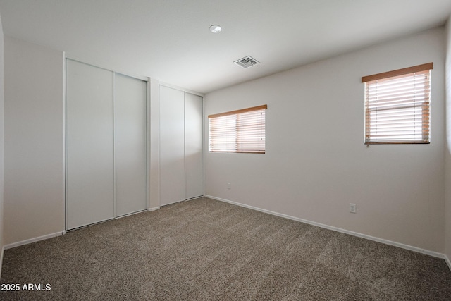 4804 S 25th Dr, Phoenix, AZ 85041 - spare room with carpet and baseboards
