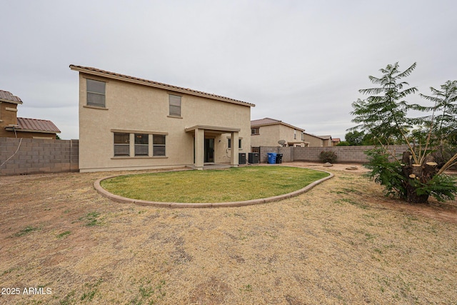 4804 S 25th Dr, Phoenix, AZ 85041 - back of property with stucco siding and central AC