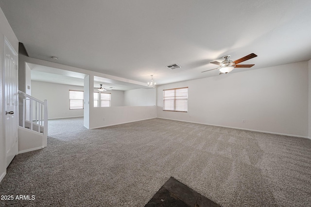 4804 S 25th Dr, Phoenix, AZ 85041 - carpeted spare room with a ceiling fan, a chandelier, and baseboards