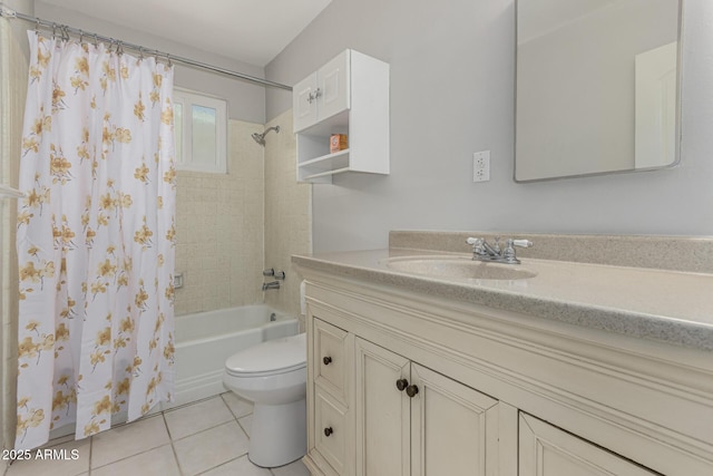 full bath featuring tile patterned flooring, vanity, toilet, and shower / bath combo with shower curtain