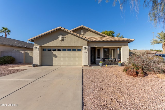 view of front of property featuring a garage