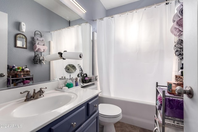 full bathroom with vanity, toilet, and shower / tub combo with curtain