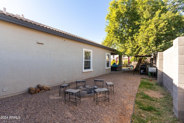 exterior space featuring a fire pit