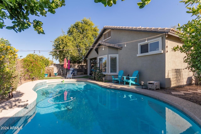 view of pool with a patio