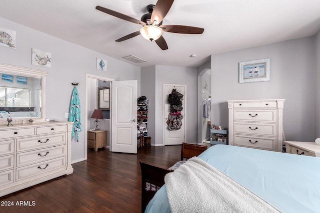 bedroom featuring ceiling fan and dark hardwood / wood-style flooring