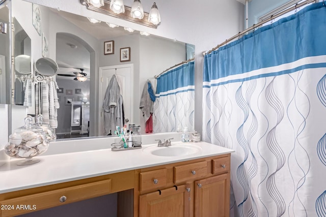 bathroom featuring vanity and ceiling fan