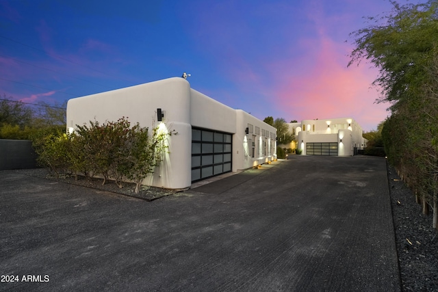 view of front of house featuring stucco siding