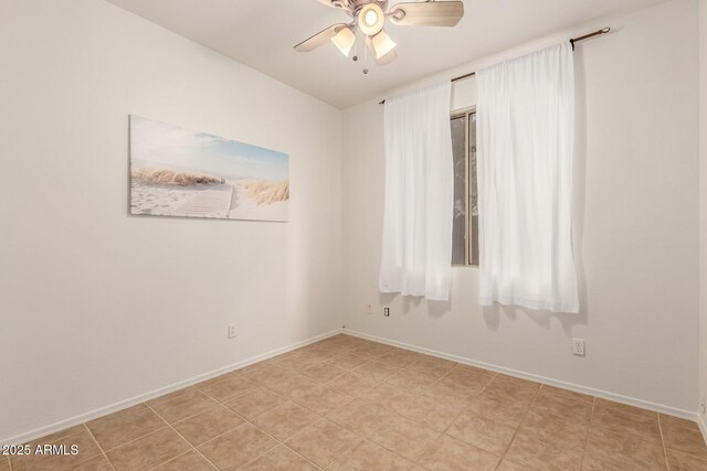 43142 N Outer Bank Dr, Anthem, AZ 85086 - spare room featuring baseboards and ceiling fan