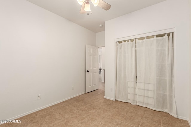 43142 N Outer Bank Dr, Anthem, AZ 85086 - unfurnished bedroom with a ceiling fan, a closet, and baseboards