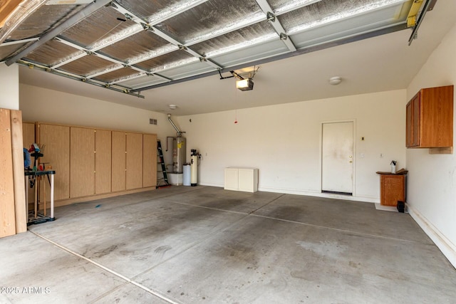 43142 N Outer Bank Dr, Anthem, AZ 85086 - garage featuring water heater and a garage door opener