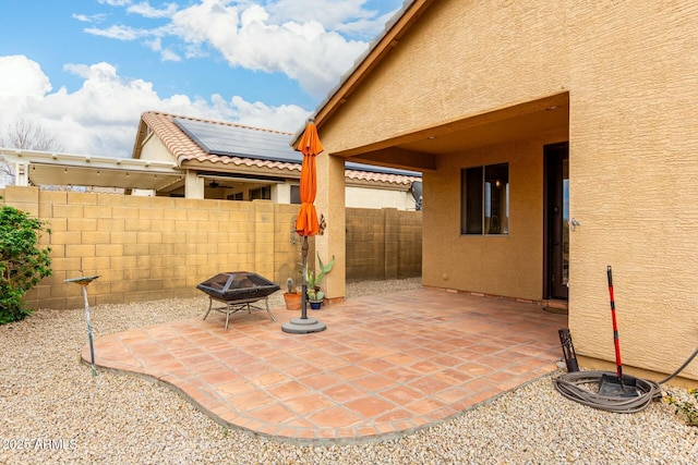 43142 N Outer Bank Dr, Anthem, AZ 85086 - view of patio / terrace featuring an outdoor fire pit and fence