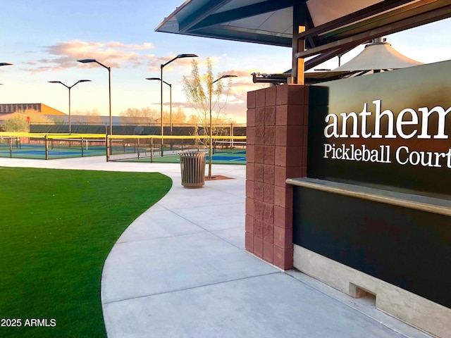 43142 N Outer Bank Dr, Anthem, AZ 85086 - surrounding community featuring a yard, a tennis court, and fence