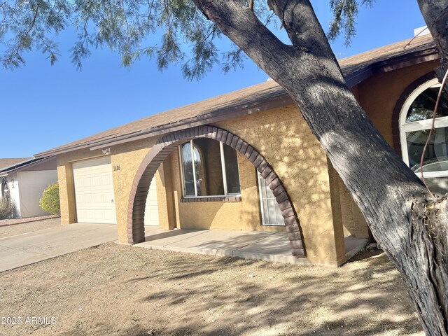 view of front of home featuring a garage