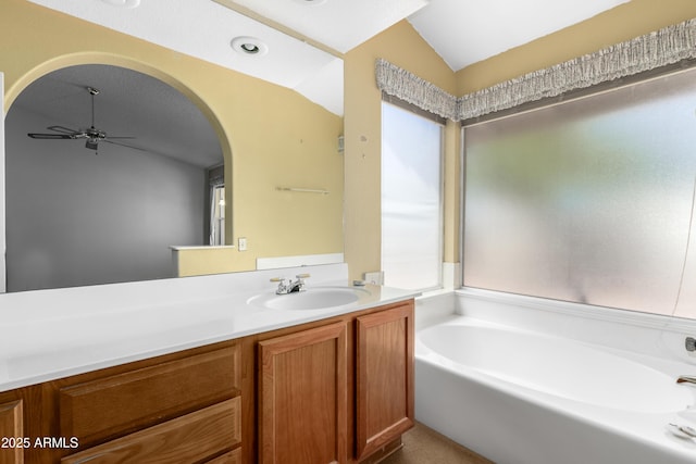 3140 N 114th Dr, Avondale, AZ 85392 - bathroom with a bath, vanity, a ceiling fan, and vaulted ceiling
