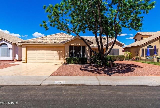 3140 N 114th Dr, Avondale, AZ 85392 - single story home with a tiled roof, stucco siding, a garage, and concrete driveway