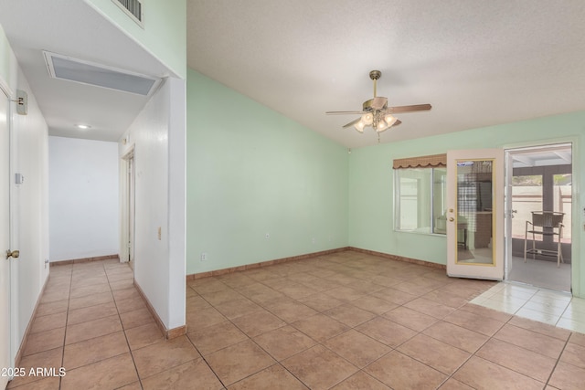 3140 N 114th Dr, Avondale, AZ 85392 - unfurnished room featuring lofted ceiling, baseboards, light tile patterned floors, visible vents, and ceiling fan
