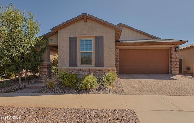 view of front of property featuring a garage