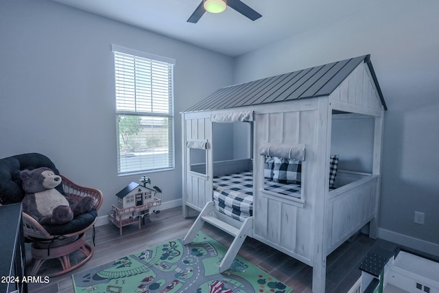 bedroom featuring ceiling fan and wood-type flooring