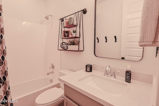 full bathroom with shower / tub combo, vanity, and toilet