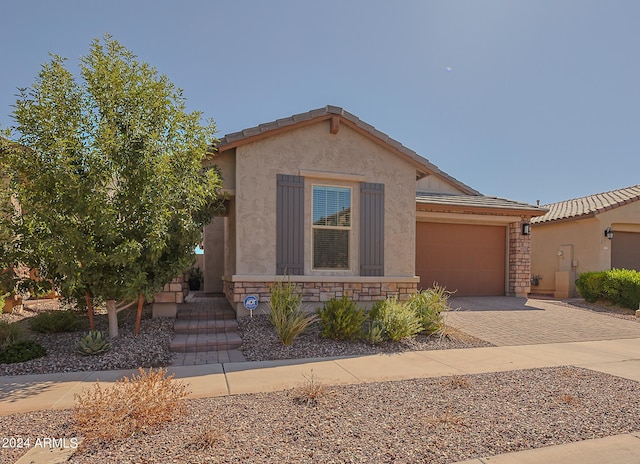 view of front of property with a garage