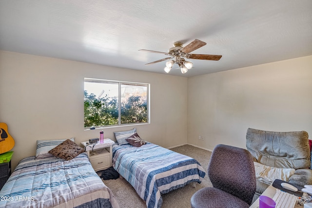 bedroom with light carpet and ceiling fan