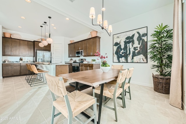 dining room with recessed lighting, a notable chandelier, and baseboards