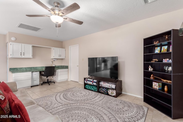 15424 N 52nd Pl, Scottsdale, AZ 85254 - living area with light tile patterned floors and a ceiling fan