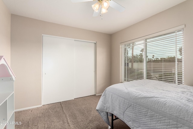 15424 N 52nd Pl, Scottsdale, AZ 85254 - bedroom featuring carpet, a closet, a ceiling fan, and baseboards