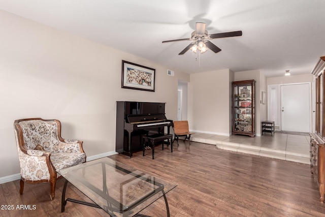 15424 N 52nd Pl, Scottsdale, AZ 85254 - living area with baseboards, ceiling fan, and light wood finished floors