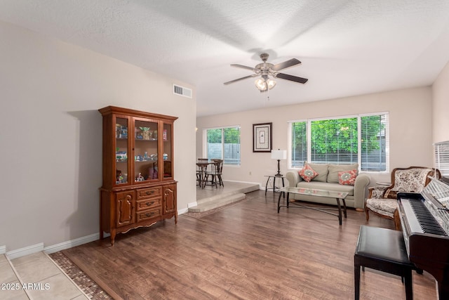 15424 N 52nd Pl, Scottsdale, AZ 85254 - living area featuring a ceiling fan, wood finished floors, and baseboards