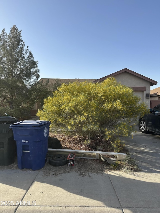 view of property exterior with stucco siding