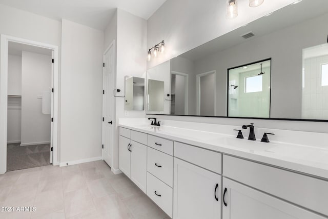 bathroom featuring vanity and walk in shower